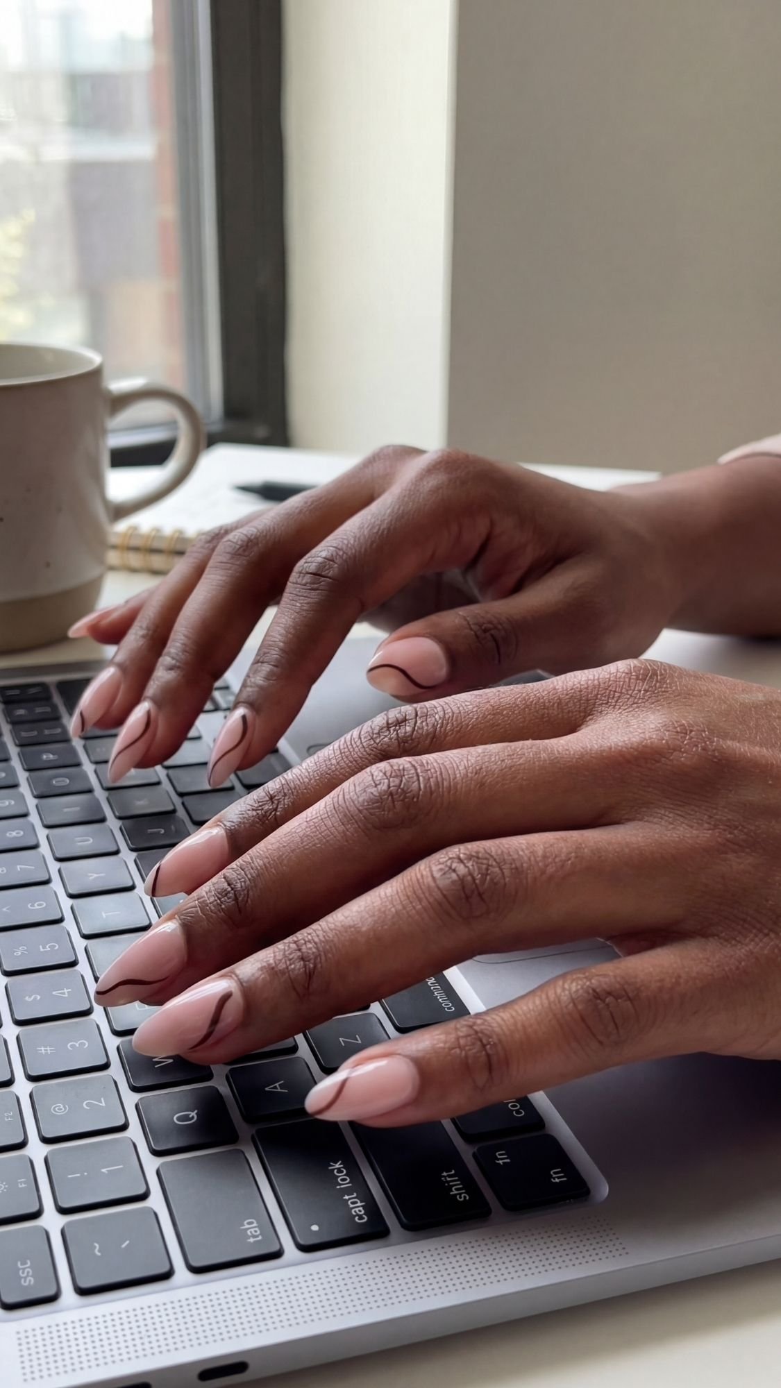 Minimal Line Art Almond Nails — Neutral almond nails accented with a single thin abstract line on each.