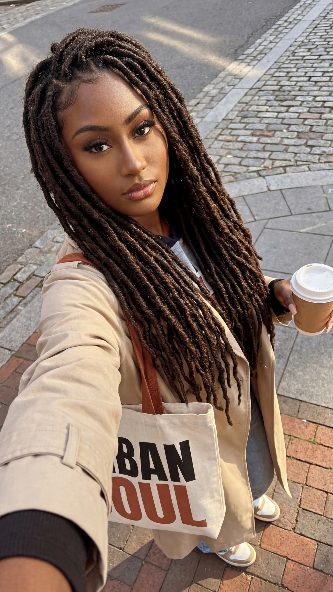 Personalized everyday tote she reaches for — neutral aesthetic tote bag photographed in use at a farmer’s market or cafe.
